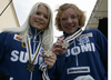 Members of third placed team of Finland with Satu Annila and Mari Laukkanen celebrating their medals won in Women 4x3.3km relay race of Junior Nordic skiing World Championships in Tarvisio, Italy. Women 4x3.3km relay race of Junior Nordic skiing World Championships in Tarvisio, Italy was held on 18th of March 2007 in Fusine, Italy. Due warm weather and lack of snow, cross country skiing races of Junior Nordic skiing World Championships 2007 were moved from Tarvisio, Italy to Fusine, Italy.
