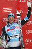 Aksel Lund Svindal of Norway celebrates on the podium after winning the mens alpine ski World Cup Super-G race in Val Gardena, Italy, Friday, December 18, 2009.
