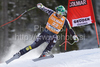 Bode Miller of United States speeds down the course during the mens alpine ski World Cup Downhill race in Val Gardena, Italy, Saturday, December 19, 2009.
