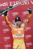 Manuel Osborne-Paradis of Canada celebrates on the podium after winning the mens alpine ski World Cup Downhill race in Val Gardena, Italy, Saturday, December 19, 2009.
