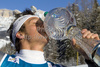 Massimiliano Blardone of Italy kisses the trophy in the finish area after winning the mens alpine ski World Cup Giant Slalom race in Alta Badia, Italy, Sunday, December 20, 2009.33
