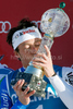 Massimiliano Blardone of Italy kisses the trophy after winning the mens alpine ski World Cup Giant Slalom race in Alta Badia, Italy, Sunday, December 20, 2009.
