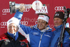 Massimiliano Blardone of Italy celebrates on the podium with his parent after winning the mens alpine ski World Cup Giant Slalom race in Alta Badia, Italy, Sunday, December 20, 2009.

