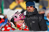 Janica Kostelic of Croatia, left, with an unidentified man during the mens alpine ski World Cup Giant Slalom race in Alta Badia, Italy, Sunday, December 20, 2009.
