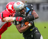 Mark De Swart (Helsinki Roosters, LB, #3) and Jaycen Taylor Spears (SWARCO Raiders Tirol, RB, #7) during quarterfinal match of European Football League between Swarco Raiders Tirol, Innsbruck, Austria, and Helsinki Roosters, Finland. Quarterfinal match of European Football League between Swarco Raiders Tirol and Helsinki Roosters was played on Saturday, 25th of May 2013 in Innsbruck, Austria.
