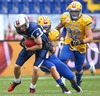 Aappo Saloranta, (Team Finland, WR, #88),  Olaf Eriksson, (Team Sweden, DB, #20) and Markus Westman, (Team Sweden, LB, #32) during the American Football European Championship 2014 group A game between Finland and Sweden at the NV Arena, St. Poelten, Austria on 2014/06/01.
