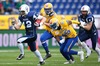 Veikka Lehtonen, (Team Finland, RB, #12) and Lamin Saho, (Team Sweden, DB, #45) during the American Football European Championship 2014 group A game between Finland and Sweden at the NV Arena, St. Poelten, Austria on 2014/06/01.
