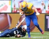 Velipekka Jaakonsaari, (Team Finland, RB, #34) and  Oliver Romer  Holmlund, (Team Sweden, WR, #86) during the American Football European Championship 2014 group A game between Finland and Sweden at the NV Arena, St. Poelten, Austria on 2014/06/01.
