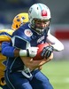 Philip Minja, (Team Sweden, DB, #21) and Miro Kadmiry, (Team Finland, QB, #7) during the American Football European Championship 2014 group A game between Finland and Sweden at the NV Arena, St. Poelten, Austria on 2014/06/01.
