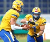 Anders Hermodsson, (Team Sweden, QB, #5) and  Sebastian Gauthier, (Team Sweden, RB, #1) during the American Football European Championship 2014 group A game between Finland and Sweden at the NV Arena, St. Poelten, Austria on 2014/06/01.
