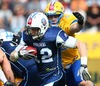 Veikka Lehtonen, (Team Finland, RB, #12) and  Markus Westman, (Team Sweden, LB, #32) during the American Football European Championship 2014 group A game between Finland and Sweden at the NV Arena, St. Poelten, Austria on 2014/06/01.
