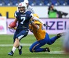 Miro Kadmiry, (Team Finland, QB, #7) and  David Strobel, (Team Sweden, DL, #91) during the American Football European Championship 2014 group A game between Finland and Sweden at the NV Arena, St. Poelten, Austria on 2014/06/01.
