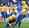 Fredrik Eklund, (Team Sweden, WR, #9) and  Ola Kimrin, (Team Sweden, K, #7) during the American Football European Championship 2014 group A game between Finland and Sweden at the NV Arena, St. Poelten, Austria on 2014/06/01.
