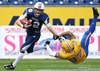 Veikka Lehtonen, (Team Finland, RB, #12) and  Rikard Robbins, (Team Sweden, DB, #37) during the American Football European Championship 2014 group A game between Finland and Sweden at the NV Arena, St. Poelten, Austria on 2014/06/01.
