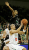 Gorenc Boris (no.10) of Union Olimpija (front) and Spencer Dewarick (no.6) of Virtus Vidivici (back) during match of 13th round of Basketball Euroleague 2007-08. Match between Union Olimpija, Ljubljana, Slovenia, and Virtus VidiVici, Bologna, Italy was played on 24th of January 2008 in Tivoli Arena in Ljubljana, Slovenia. Match was won by Union Olimpija, who defeated Virtus VidiVici with 75:60.
