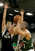 Marko Milic (no.12) of Union Olimpija (R) shooting over Novica Velickovic (no.12) of KK Partizan Igokea (L) during second half finals match of Basketball NLB League final four between Union Olimpija, Ljubljana, Slovenia and Partizan Beograd, Serbia. Match between Union Olimpija and Partizan Begrad was played on 25th of April 2008 in Tivoli Arena in Ljubljana, Slovenia. Match was won by Partizan, who defeated Union Olimpija with 94:90.
