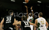 Cristopher Booker (no.6) of Union Olimpija (M) shooting over Slavko Vranes (no.33) of KK Partizan Igokea (L), Novica Velickovic (no.12) of KK Partizan Igokea (2nd from L) and Marko Milic (no.12) of Union Olimpija (R) during second half finals match of Basketball NLB League final four between Union Olimpija, Ljubljana, Slovenia and Partizan Beograd, Serbia. Match between Union Olimpija and Partizan Begrad was played on 25th of April 2008 in Tivoli Arena in Ljubljana, Slovenia. Match was won by Partizan, who defeated Union Olimpija with 94:90.
