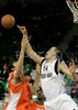 Nikola Pekovic (no.14) of KK Partizan Igokea (R) and Boban Marjanovic (no.20) of KK Hemofarm Stada (L) jumping for ball during finals match of Basketball NLB League final four between Partizan Beograd, Serbia and Hemofarm Stada, Vrsac, Serbia. Match between Hemofarm Stada and Partizan Begrad was played on 26th of April 2008 in Tivoli Arena in Ljubljana, Slovenia. Match was won by Partizan, who defeated Hemofarm with 69:51.

