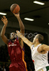 Andre Hutson (no.9) of Lottomatica Roma (L) shooting over Marko Milic (no.12) of Union Olimpija (R) during match of Basketball Euroleague between Union Olimpija, Ljubljana, Slovenia and Lottomatica Roma, Italy. Match between Union Olimpija and Lottomatica Roma was played on 6th of November 2008 in Tivoli Arena in Ljubljana, Slovenia.
