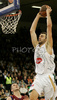 Mirza Begic (no.15) of Union Olimpija scoring during match of Basketball Euroleague between Union Olimpija, Ljubljana, Slovenia and Lottomatica Roma, Italy. Match between Union Olimpija and Lottomatica Roma was played on 6th of November 2008 in Tivoli Arena in Ljubljana, Slovenia.
