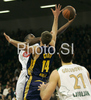 Franklin Robinson (no.14) of Union Olimpija (L) scoring over Adam Chubb (no.14) of Alba Berlin (R) during match of Basketball Euroleague between Union Olimpija, Ljubljana, Slovenia and Alba Berlin, Germany. Match between Union Olimpija and Alba Berlin was played on 27th of November 2008 in Tivoli Arena in Ljubljana, Slovenia.
