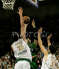 Edu Hernandez-Sonseca (no.16) of DKV Joventut (M) between Mirza Begic (no.15) of Union Olimpija (L) nd Saso Ozbolt (no.31) of Union Olimpija (R) during match of Basketball Euroleague between Union Olimpija, Ljubljana, Slovenia and DKV Joventut, Badalona, Spain. Match between Union Olimpija and DKV Joventut was played on 4th of December 2008 in Tivoli Arena in Ljubljana, Slovenia.
