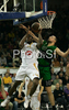Franklin Robinson (no.14) of Union Olimpija (L) and Luka Bogdanovic (no.10) of DKV Joventut (R) during match of Basketball Euroleague between Union Olimpija, Ljubljana, Slovenia and DKV Joventut, Badalona, Spain. Match between Union Olimpija and DKV Joventut was played on 4th of December 2008 in Tivoli Arena in Ljubljana, Slovenia.
