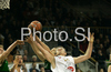 Miha Zupan (no.24) of Union Olimpija (R) jumping for ball during match of Basketball Euroleague between Union Olimpija, Ljubljana, Slovenia and DKV Joventut, Badalona, Spain. Match between Union Olimpija and DKV Joventut was played on 4th of December 2008 in Tivoli Arena in Ljubljana, Slovenia.
