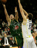 Marko Milic (no.12) of Union Olimpija (L) and Oguz Savas (no.21) of Fenerbahce Ulker (R) during match of Basketball Euroleague between Union Olimpija, Ljubljana, Slovenia and Fenerbahce Ulker, Turkey. Match between Union Olimpija and Fenerbahce Ulker was played on 8th of January 2009 in Tivoli Arena in Ljubljana, Slovenia.
