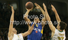 David Bluethenthal (no.15) of Maccabi Electra (M) between Gasper Vidmar (no.13) of Union Olimpija (R) and Edin Bavcic (no.9) of Union Olimpija (L) during match of Basketball Euroleague between Union Olimpija, Ljubljana, Slovenia and Maccabi Electra, Tel Aviv, Israel. Match between Union Olimpija and Maccabi Electra was played on 3rd of December 2009 in Tivoli Arena in Ljubljana, Slovenia.
