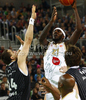 Kevinn Pinkney (no.21) of Union Olimpija (M) between Jan Vesely (no.24) of Partizan mts (R) and Rasko Katic (no.14) of Partizan mts (L) during match of NLB Adriatic basketball League between Union Olimpija and Partizan. Match of NLB Adriatic basketball League between Union Olimpija, Ljubljana, Slovenia and Partizan, Belgrade, Serbia was played in Stozice Arena, Ljubljana, Slovenia, on Sunday, 31st of October 2010.
