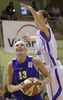 Frida Grahn (no.13) of Sweden (L) and Tina Trebec (no.11) of Slovenia (R) during Women FIBA Basketball Division B group A match between Slovenia and Sweden. Match of 4th round of Women FIBA Basketball Division B group A competition was played in Vitranc Arena in Kranjska Gora, Slovenia, on 5th od June 2011.
