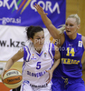 Natasa Radulovic (no.5) of Slovenia (L) and Louice Halvarsson (no.14) of Sweden (R) during Women FIBA Basketball Division B group A match between Slovenia and Sweden. Match of 4th round of Women FIBA Basketball Division B group A competition was played in Vitranc Arena in Kranjska Gora, Slovenia, on 5th od June 2011.
