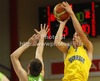 Tobias Borg of Sweden (R) shooting over Jan Span of Slovenia (L) during FIBA U-20 European Championships match between Slovenia and Sweden. Match between Slovenia and Sweden of FIBA U-20 European basketball Championships was played on Friday, 13th of July 2012 in Domzale, Slovenia.
