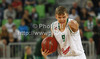 Team captain of Union Olimpija, Teemu Rannikko (no.9) commanding team on play field during Turkish Airlines Euroleague basketball match of second round between Union Olimpija, Ljubljana, Slovenia and Fenerbahce Ulker, Istanbul, Turkey. Match between Union Olimpija and Fenerbahce Ulker was played in in Stozice Arena in Ljubljana, Slovenia, on Friday, 19th of October 2012.
