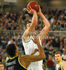Alen Omic (no.23) of Union Olimpija (R) shooting over Nikola Mirotic (no.12) of Real Madrid (L) during Turkish Airlines Euroleague basketball match of fifth round between Union Olimpija, Ljubljana, Slovenia and Real Madrid, Spain. Match between Union Olimpija and Real Madrid was played in in Stozice Arena in Ljubljana, Slovenia, on Friday, 9th of November 2012.
