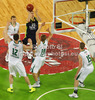 Jaycee Carroll (no.20) of Real Madrid shooting between players of Union Olimpija during Turkish Airlines Euroleague basketball match of fifth round between Union Olimpija, Ljubljana, Slovenia and Real Madrid, Spain. Match between Union Olimpija and Real Madrid was played in in Stozice Arena in Ljubljana, Slovenia, on Friday, 9th of November 2012.
