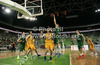 Dino Muric (no.11) of Union Olimpija (R) scoring during Turkish Airlines Euroleague basketball match of sixth round between Union Olimpija, Ljubljana, Slovenia and BC Khimki Moscow, Russia. Match between Union Olimpija and BC Khimki Moscow was played in in Stozice Arena in Ljubljana, Slovenia, on Friday, 7th of December 2012.
