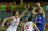 Hanno Mottola (no.13) of Finland (R) shooting over Hidayet Turkoglu (no.15) of Turkey (M) and Omer Asik (no.14) of Turkey (L) during FIBA European basketball championships 2013 match between Finland and Turkey. Match between Finland and Turkey was played on Wednesday, 4th of September 2013 in Bonifika arena in Koper, Slovenia.
