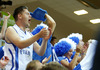 Finnish fans cheering for their team during FIBA European basketball championships 2013 match between Finland and Turkey. Match between Finland and Turkey was played on Wednesday, 4th of September 2013 in Bonifika arena in Koper, Slovenia.
