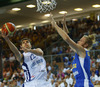Samuel Haanpaa (no.12) of Finland (L) and Jonathan Skjoldebrand (no.5) of Sweden (R) during FIBA European basketball championships 2013 match between Finland and Sweden. Match between Finland and Sweden was played on Thursday, 5th of September 2013 in Bonifika arena in Koper, Slovenia.
