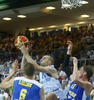 Tuukka Kotti (no.10) of Finland (M) jumping for ball between Joakim Kjellbom (no.6) of Sweden (L) and Jonas Jerebko (no.11) of Sweden (R) during FIBA European basketball championships 2013 match between Finland and Sweden. Match between Finland and Sweden was played on Thursday, 5th of September 2013 in Bonifika arena in Koper, Slovenia.
