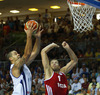Gerald Lee (no.8) of Finland (L) and Sergey Monya (no.12) of Russia (R) during FIBA European basketball championships 2013 match between Finland and Russia. Match between Finland and Russia was played on Sunday, 8th of September 2013 in Bonifika arena in Koper, Slovenia.
