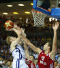 Kimmo Muurinen (no.6) of Finland (L) shooting over Sergey Monya (no.12) of Russia (R) during FIBA European basketball championships 2013 match between Finland and Russia. Match between Finland and Russia was played on Sunday, 8th of September 2013 in Bonifika arena in Koper, Slovenia.
