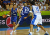 Petteri Koponen (no.11) of Finland (L) trying to get close to basket while Tuukka Kotti (no.10) of Finland (M) trying to block Georgios Printezis (no.15) of Greece (R) during FIBA European basketball championships 2013 match between Finland and Greece. Match between Finland and Greece was played on Monday, 9th of September 2013 in Bonifika arena in Koper, Slovenia.
