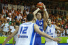 Roope Ahonen (no.14) of Finland (M) shooting over Loukas Mavrokefalidis (no.12) of Greece (L) during FIBA European basketball championships 2013 match between Finland and Greece. Match between Finland and Greece was played on Monday, 9th of September 2013 in Bonifika arena in Koper, Slovenia.
