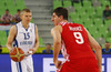 Teemu Rannikko (no.15) of Finland (L) and Damjan Rudez (no.9) of Croatia (R) during FIBA European basketball championships 2013 match of second round between Finland and Croatia. Match between Finland and Croatia was played on Thursday, 12th of September 2013 in Stozice arena in Ljubljana, Slovenia.
