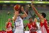 Teemu Rannikko (no.15) of Finland (L) shooting over Krunoslav Simon (no.11) of Croatia (R) during FIBA European basketball championships 2013 match of second round between Finland and Croatia. Match between Finland and Croatia was played on Thursday, 12th of September 2013 in Stozice arena in Ljubljana, Slovenia.
