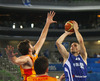 Tuukka Kotti (no.10) of Finland (R) shooting over Marc Gasol (no.13) of Spain (L) during FIBA European basketball championships 2013 match of second round between Finland and Spain. Match between Finland and Spain was played on Saturday, 14th of September 2013 in Stozice arena in Ljubljana, Slovenia.
