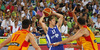 Petteri Koponen (no.11) of Finland (M) between Spanish players during FIBA European basketball championships 2013 match of second round between Finland and Spain. Match between Finland and Spain was played on Saturday, 14th of September 2013 in Stozice arena in Ljubljana, Slovenia.
